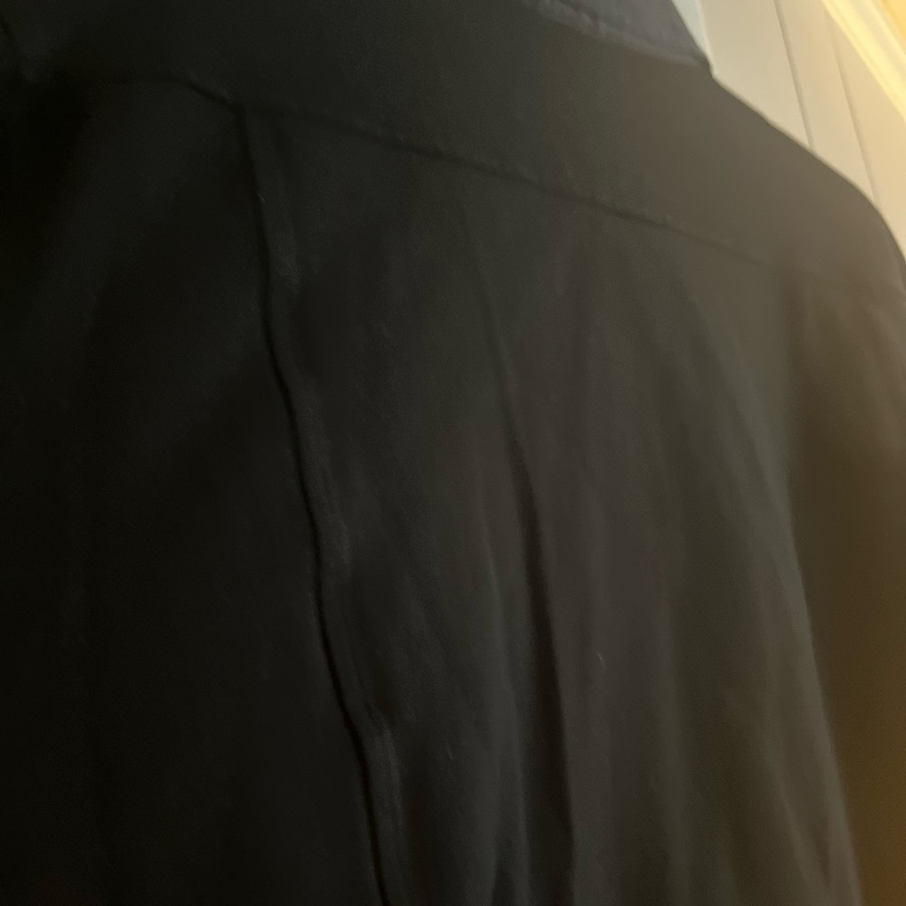 Beautiful vintage property of Chanel luxury stretchy, long sleeve polo